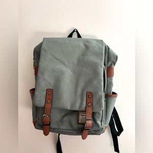 Sage colored backpack and laptop holder